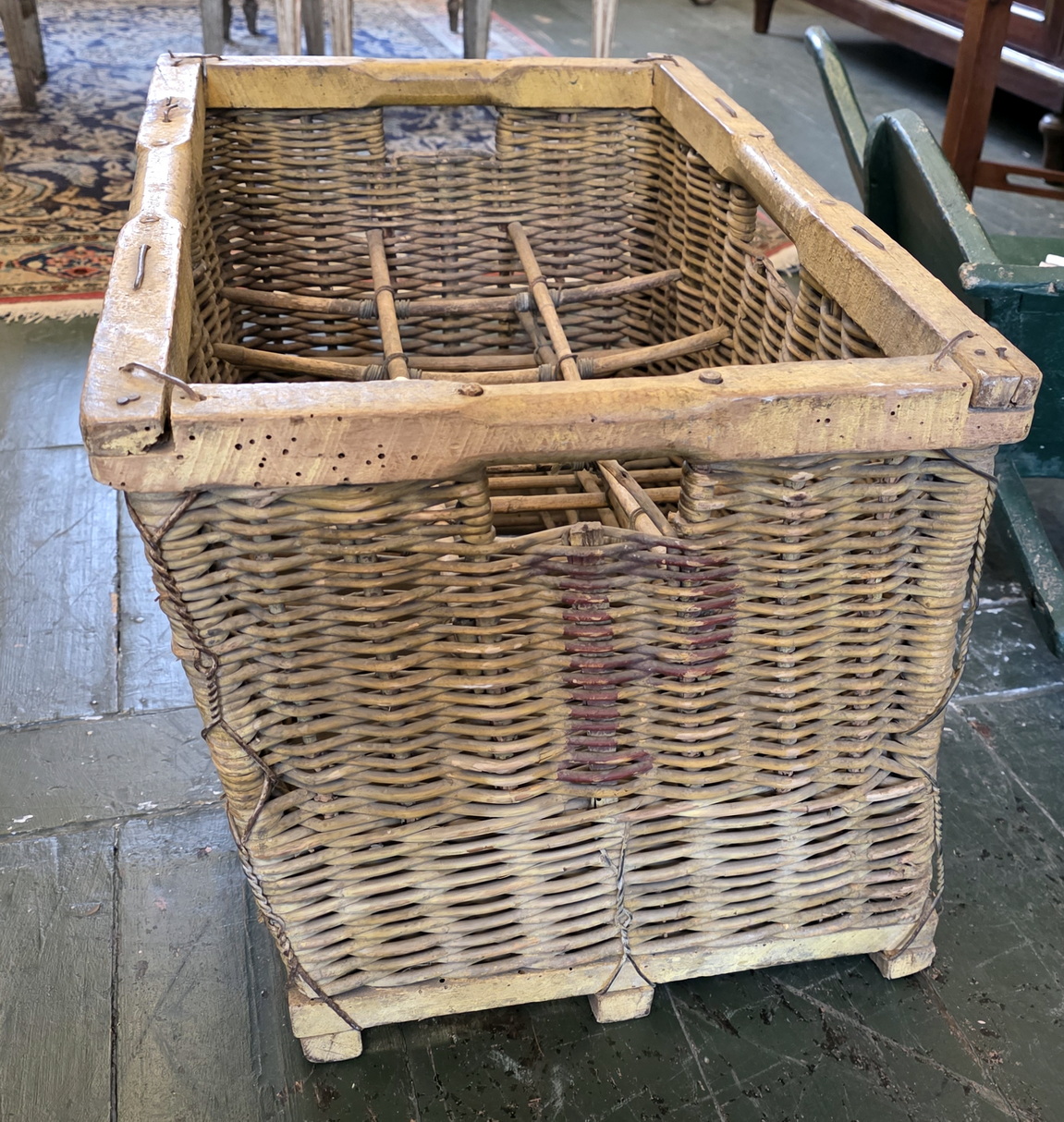 A French Byrrh Bottle Basket A French Byrrh Bottle Basket